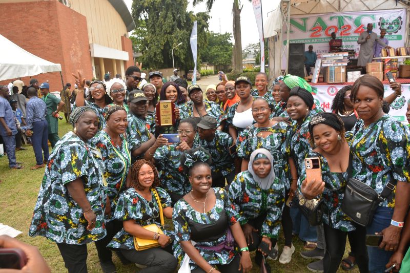 Childs head adorned with colorful dots, resembling a celestial constellation.